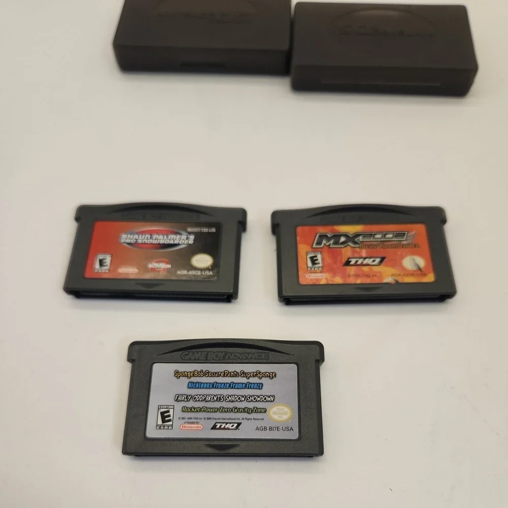 MX 2002 - Nintendo Game Boy Advance SpongeBob Shaun Palmers 2 cases lot of 3